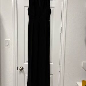 Mango Elegant Black Sleeveless jumpsuit with cross over detail. New with tags